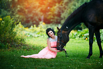 Image showing beautiful girl in dress with horse