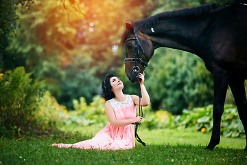 Image showing beautiful girl in dress with horse