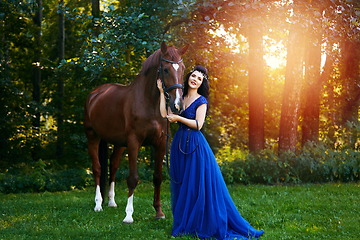 Image showing beautiful girl in dress with horse