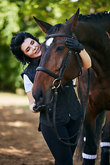 Image showing beautiful girl with horse