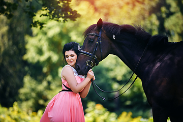 Image showing beautiful girl in dress with horse