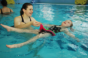 Image showing Little girl with mum