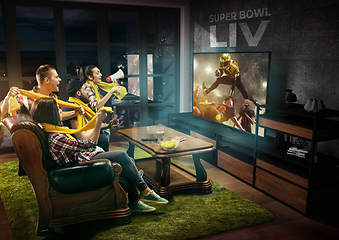 Image showing Group of friends watching TV, american football championship