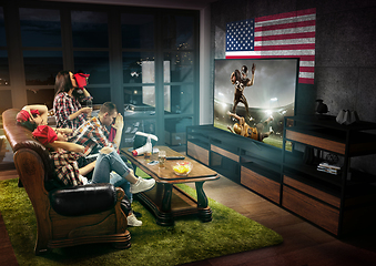 Image showing Group of friends watching TV, american football championship