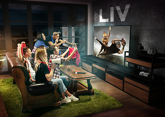 Image showing Group of friends watching TV, american football championship