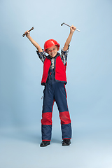 Image showing Boy dreaming about future profession of engineer