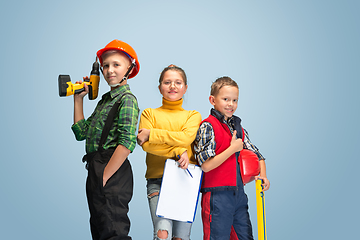 Image showing Kids dreaming about future profession of engineer