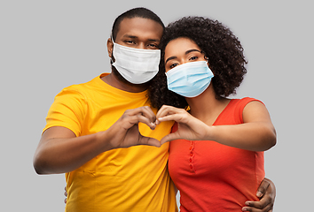 Image showing african american couple in medical masks