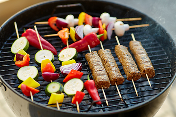 Image showing barbecue meat and vegetables roasting on grill