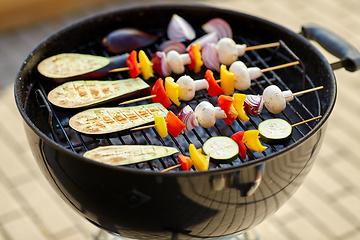 Image showing vegetables and mushrooms roasting on brazier grill