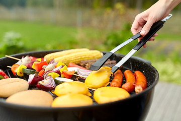 Image showing barbecue kebab meat and vegetables on grill