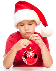 Image showing Young unhappy girl in christmas cloth