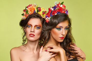 Image showing beautiful girls with flower accessories
