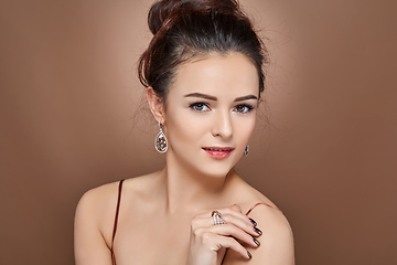 Image showing beautiful girl with makeup and hairdo