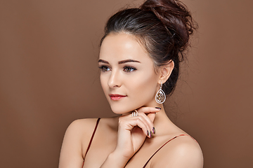 Image showing beautiful girl with makeup and hairdo