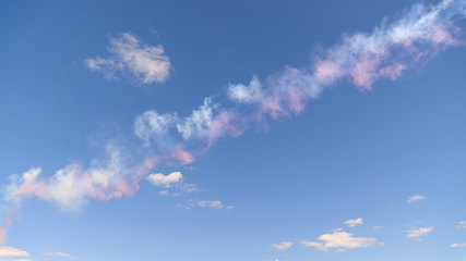 Image showing Beautiful three colored clouds on a blue sky.