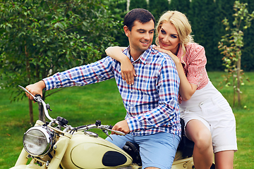 Image showing beautiful couple on retro motorbike