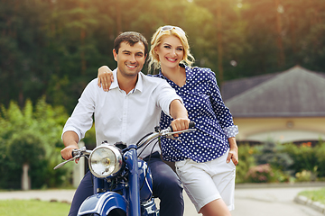 Image showing beautiful couple on retro motorbike