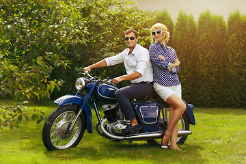 Image showing beautiful couple on retro motorbike