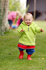 Image showing One year old girl on the walk