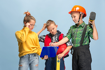 Image showing Kids dreaming about future profession of engineer