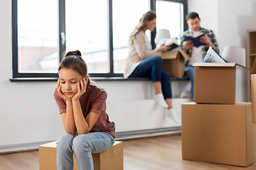 Image showing sad girl moving to new home with her family