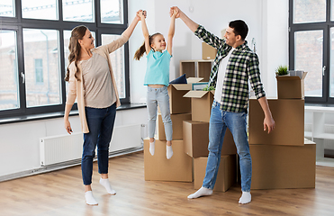 Image showing happy family with child moving to new home