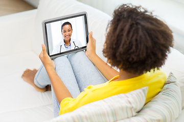 Image showing patient having video chat with doctor on tablet pc