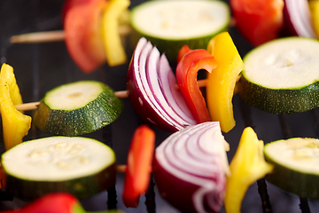 Image showing close up of vegetables roasting on brazier grill