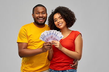 Image showing happy african american couple with euro money