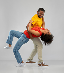 Image showing happy smiling african american couple dancing