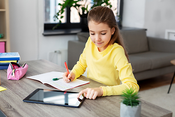 Image showing student girl with tablet pc notebook at home