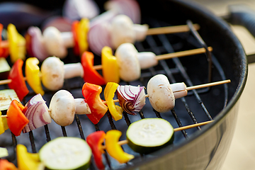 Image showing vegetables and mushrooms roasting on brazier grill