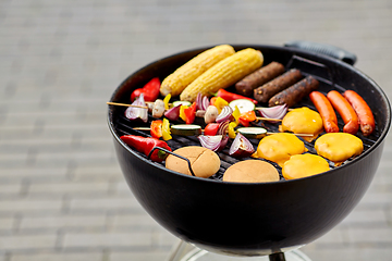 Image showing barbecue kebab meat and vegetables on grill