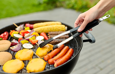 Image showing barbecue kebab meat and vegetables on grill