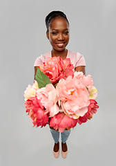 Image showing happy african american woman with bunch of flowers