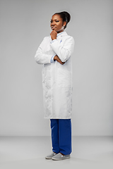 Image showing happy african american female doctor or scientist