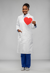 Image showing african american female doctor with red heart