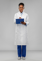 Image showing african american female doctor with clipboard