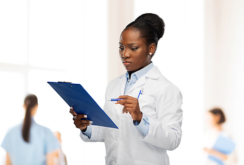 Image showing african american female doctor with clipboard