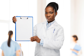 Image showing african american female doctor with clipboard