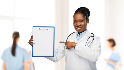 Image showing african american female doctor with clipboard