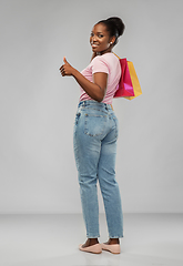 Image showing happy african american woman with shopping bags