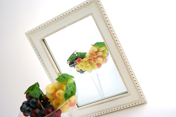 Image showing Isolated Grapes In a Glass