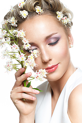 Image showing beautiful girl with flowers in hair