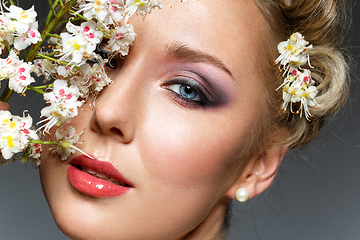 Image showing beautiful girl with flowers in hair