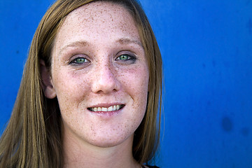 Image showing Close up on a Beautiful Girl with Blue Background