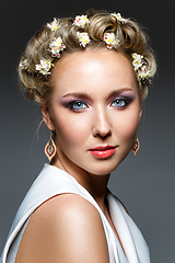 Image showing beautiful girl with flowers in hair