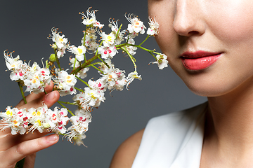 Image showing beautiful girl with flowers in hair