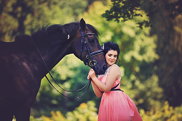 Image showing beautiful girl in dress with horse